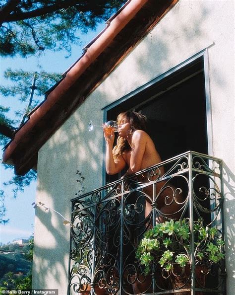 Halle Berry Poses Nude While Drinking Wine on Her Balcony